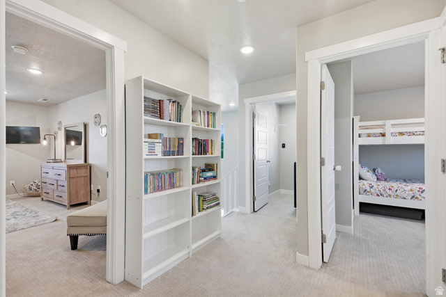 3244 West 1670th Street North Provo, UT 84601 - Photo 37 of 56 Hallway featuring neutral carpet flooring and recessed lighting