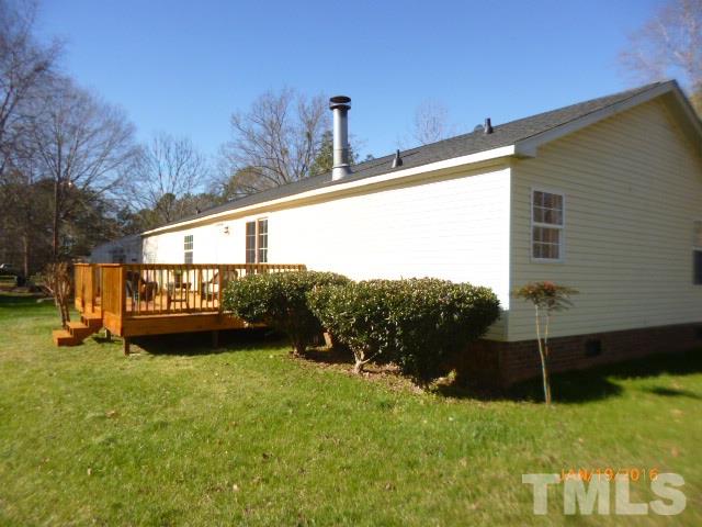 523 Poplar Springs Church Road Raleigh, NC 27603 - Photo 20 of 24 a view of a back yard of the house