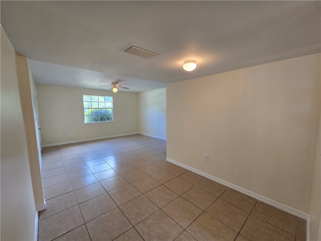 1748 23rd Street Vero Beach, FL 32960 - Photo 4 of 10 a view of an empty room with windows