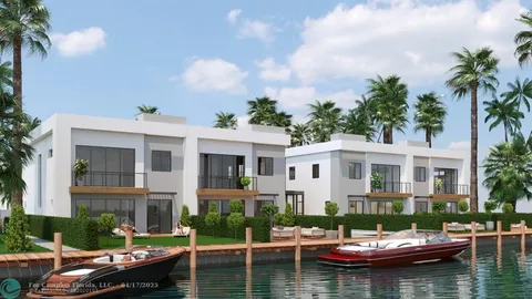 a view of a house with swimming pool and a chairs
