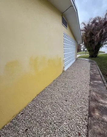 a view of an empty room and a yard