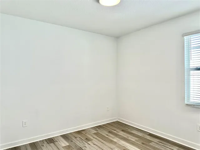 a view of a room that has a window