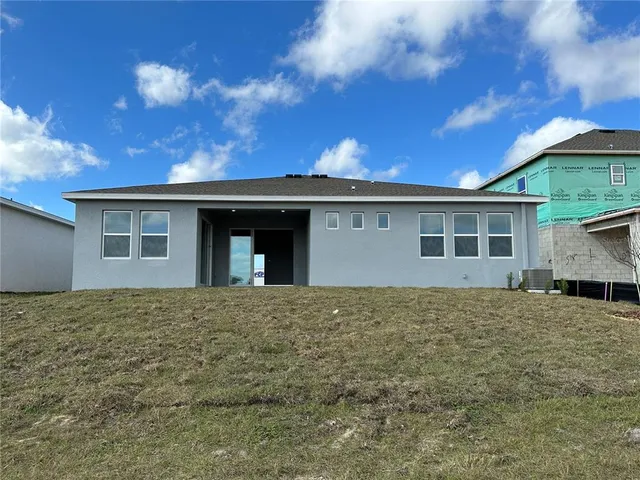 a view of a house with a patio