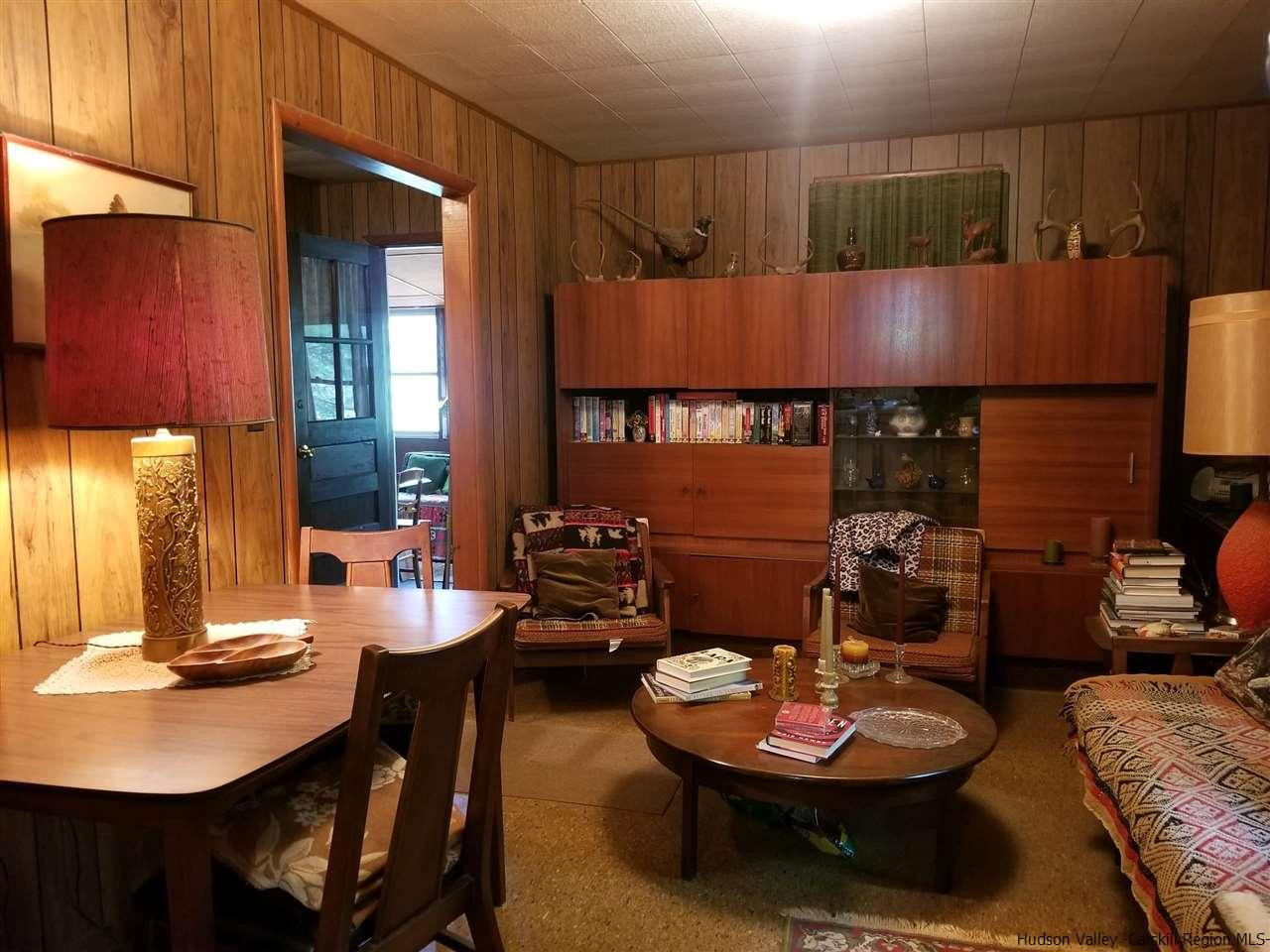 545 Upper Cherrytown Road Kerhonkson, NY 12446 - Photo 26 of 35 a view of a dining room with furniture
