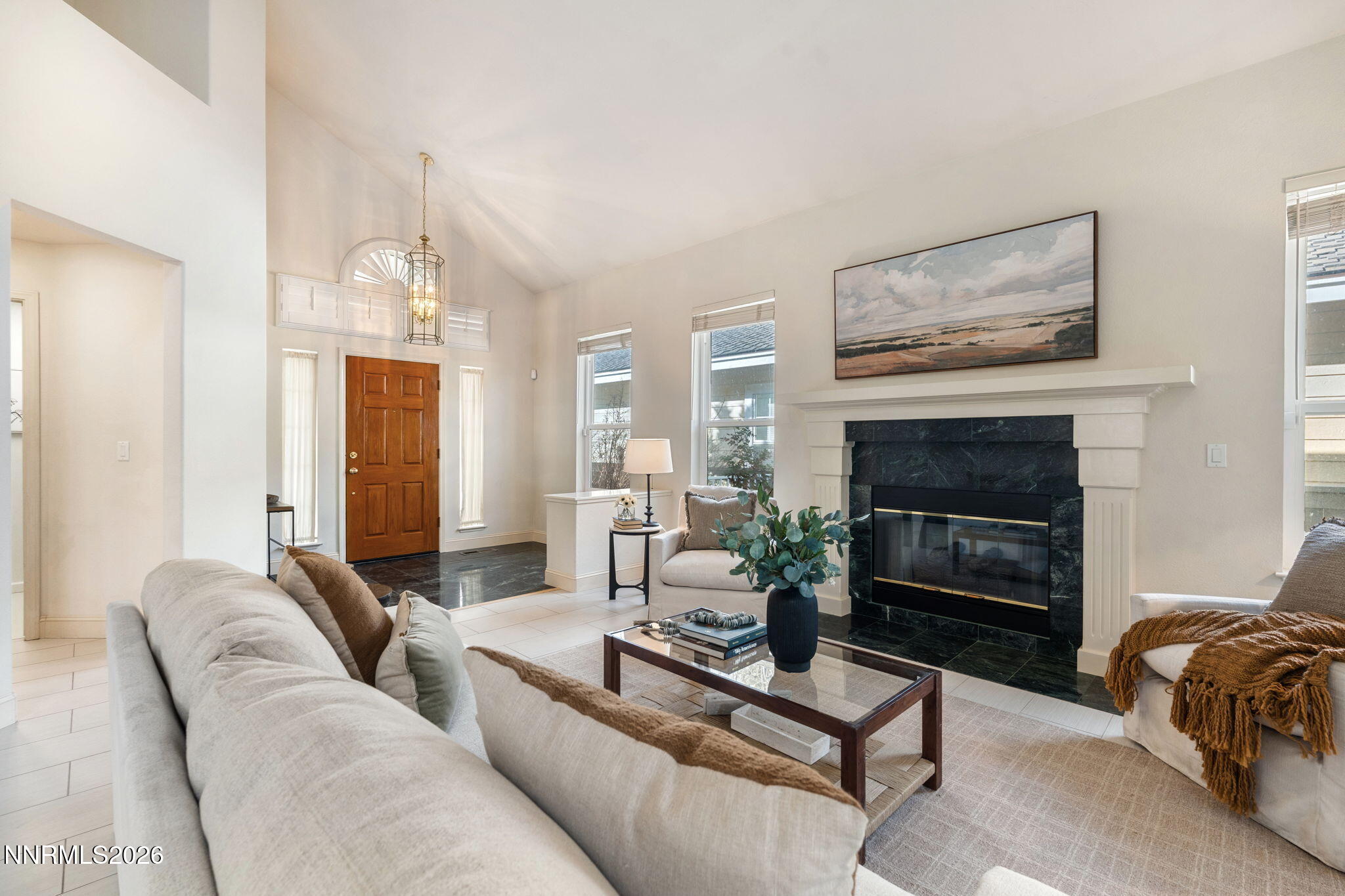 6186 Squires Lane Reno, NV 89519 - Photo 5 of 57 a living room with furniture and a fireplace