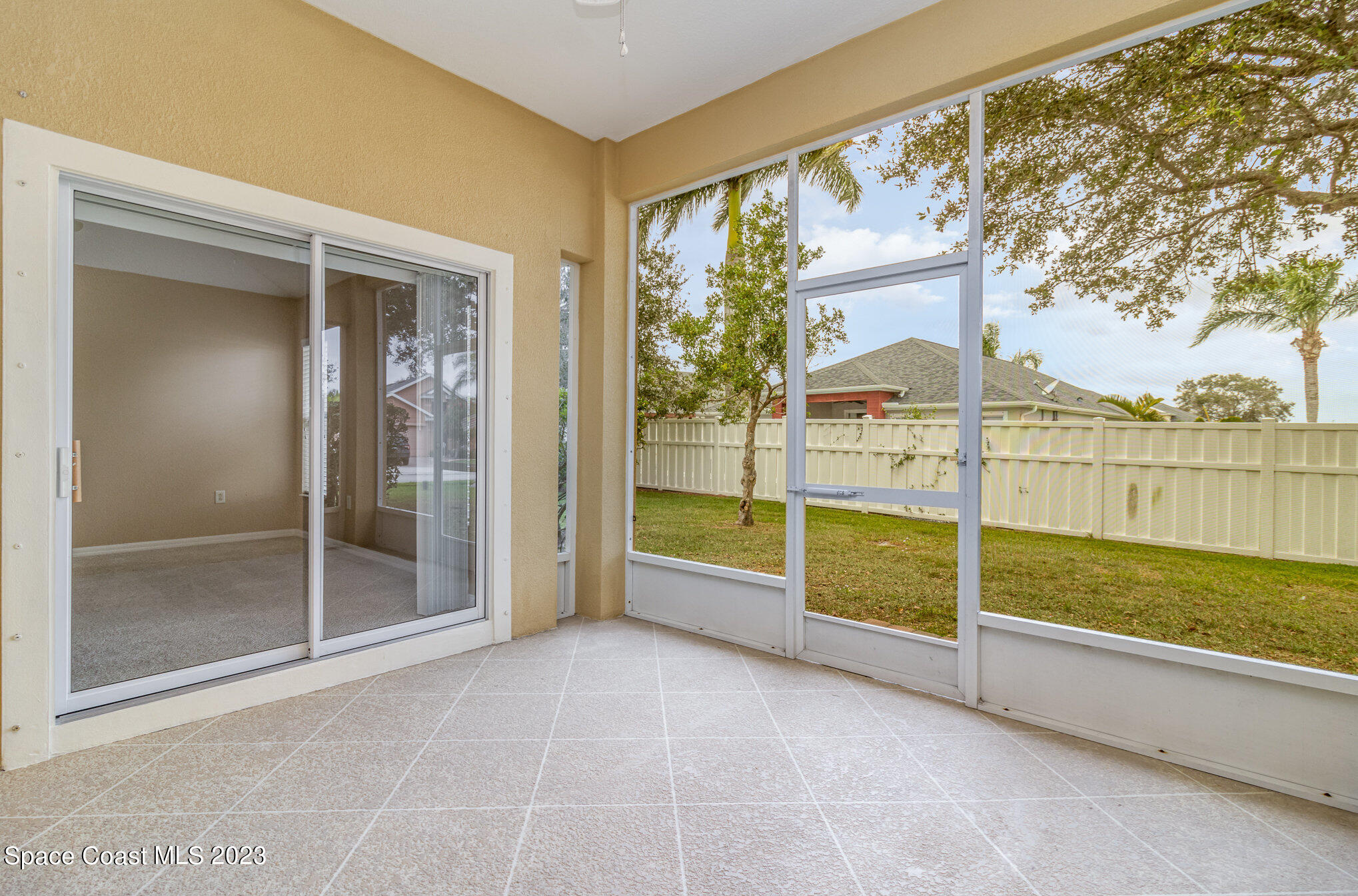 3504 Fodder Drive Rockledge, FL 32955 - Photo 2 of 20 a view of an empty room with glass windows