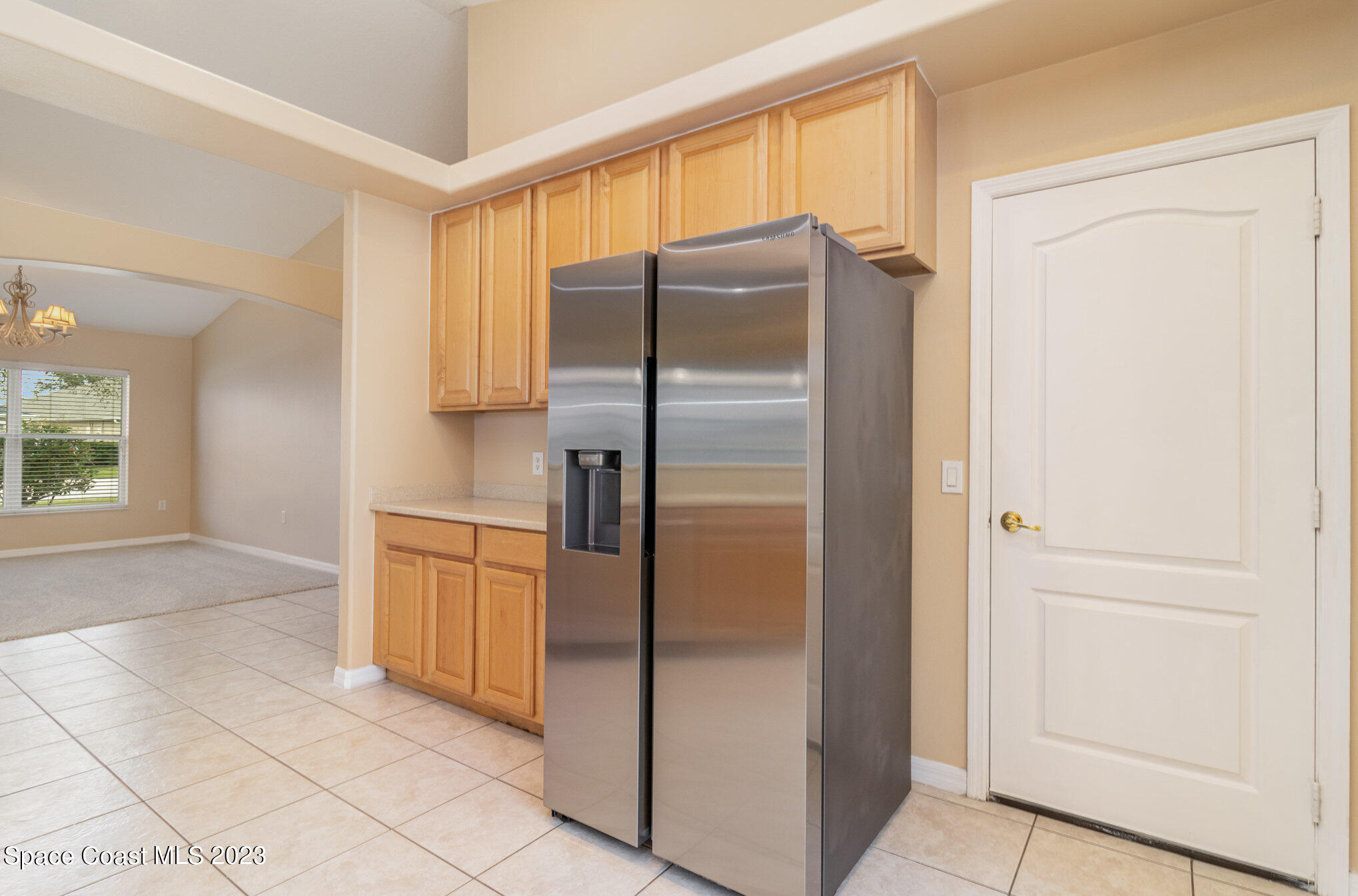 3504 Fodder Drive Rockledge, FL 32955 - Photo 4 of 20 a kitchen with stainless steel appliances granite countertop a refrigerator and a sink