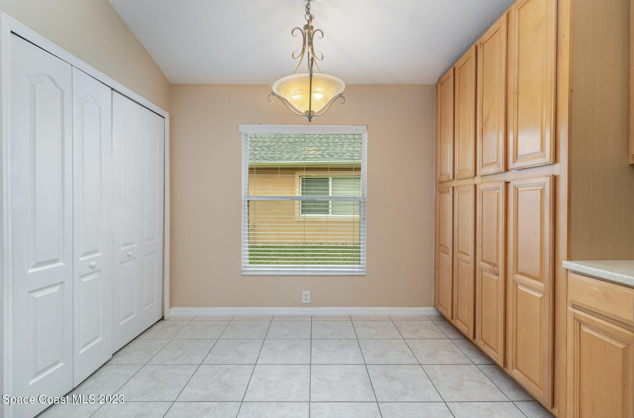 3504 Fodder Drive Rockledge, FL 32955 - Photo 5 of 20 a view of an entryway with a chandelier