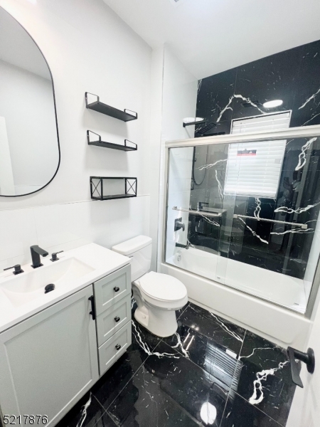 626 South 20th Street, Unit 3 Newark, NJ 07103 - Photo 2 of 11 a bathroom with a sink toilet and tub