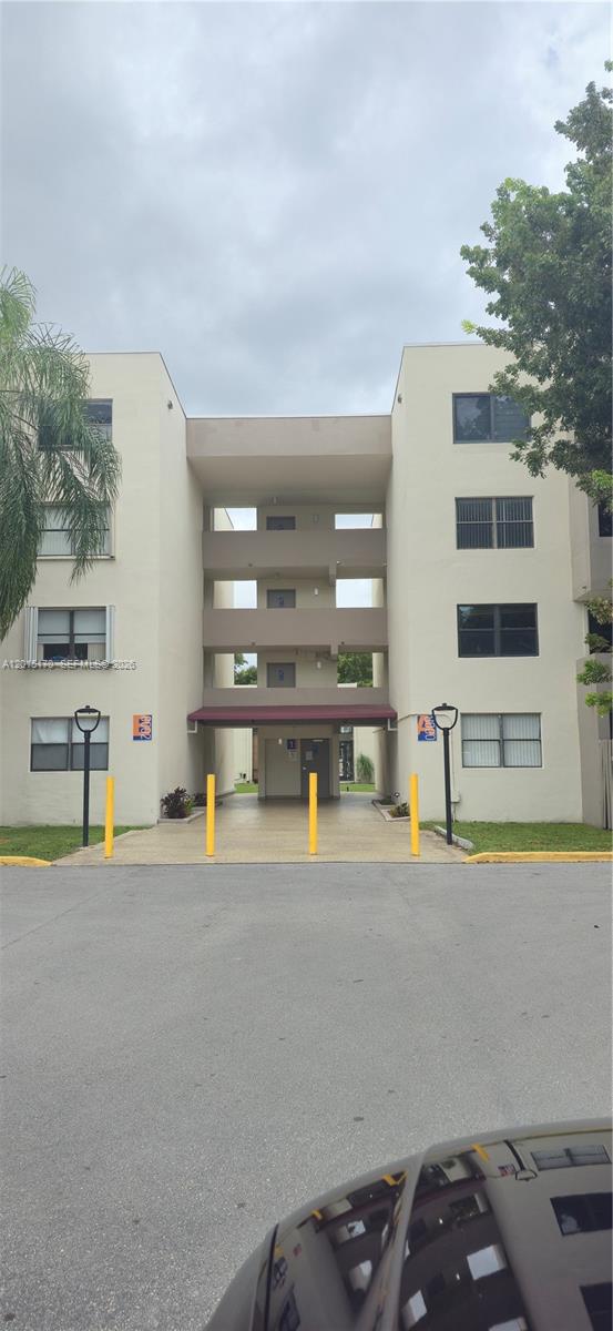 8002 Southwest 149th Avenue, Unit B216 Miami, FL 33193 - Photo 2 of 21 a view of a swimming pool with a balcony