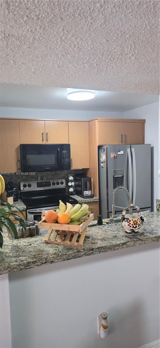 8002 Southwest 149th Avenue, Unit B216 Miami, FL 33193 - Photo 5 of 21 a view of a swimming pool with an outdoor seating