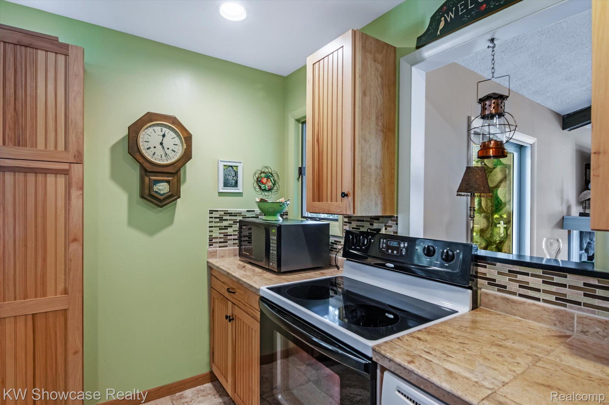 9220 Mcgregor Road Pinckney, MI 48169 - Photo 16 of 40 The Kitchen has a view of the water too.