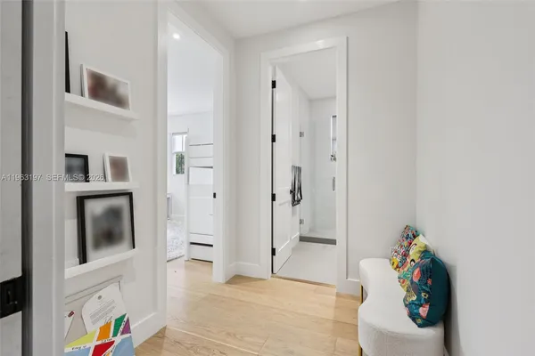 a living room with furniture a window and a table