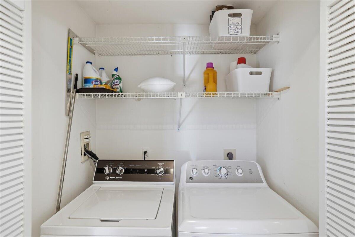100 Mid-Iron Way, Unit 7027 Mashpee, MA 02649 - Photo 22 of 38 a utility room with dryer and washer