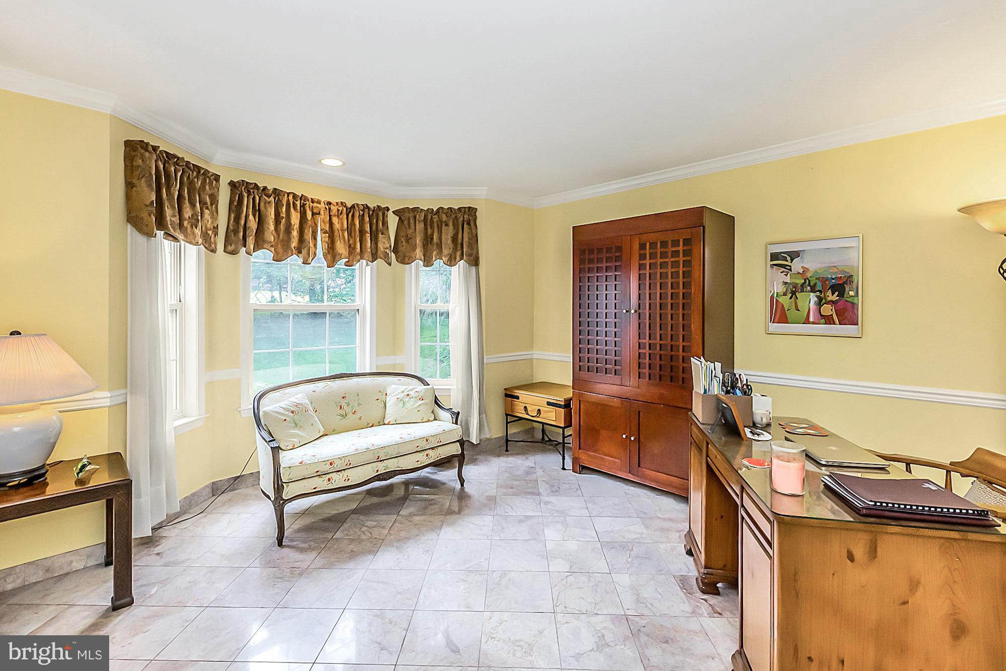 50 Lee Road Norristown, PA 19403 - Photo 6 of 49 Living Room with chair rail & crown molding