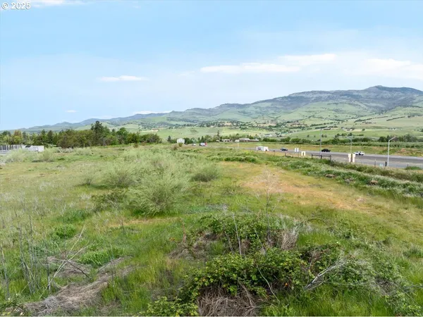 a view of lake with mountain