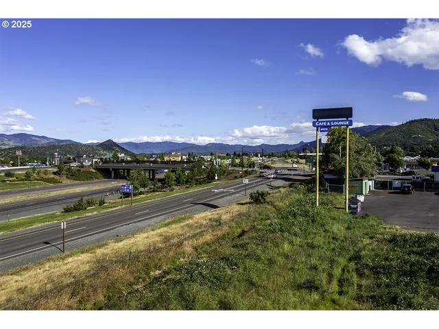 a view of a street with a houses