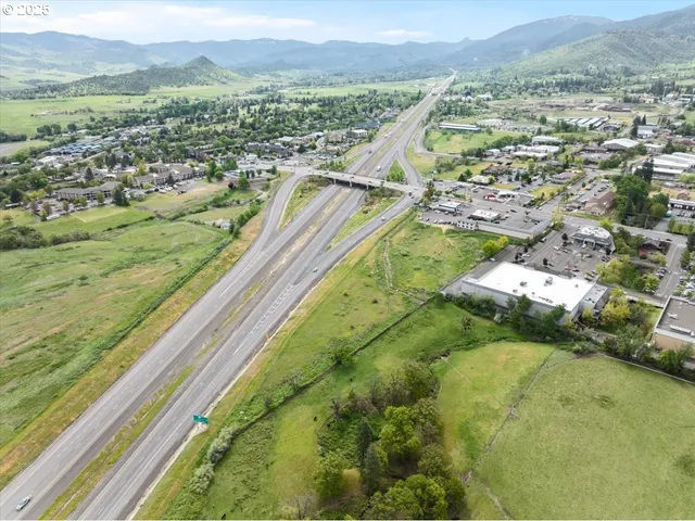 a view of a city with mountains