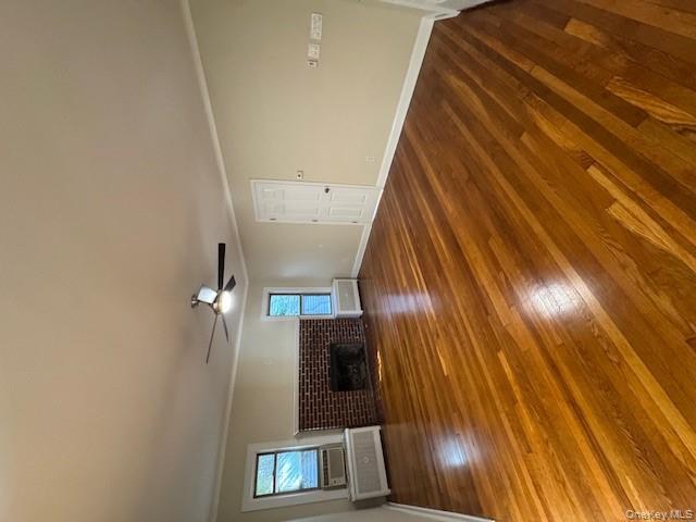 39 Ward Street, Unit 1 Floral Park, NY 11001 - Photo 5 of 11 a view of empty room with wooden floor