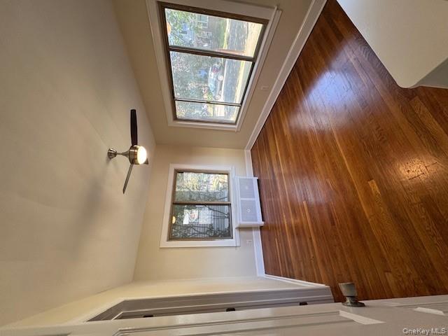 39 Ward Street, Unit 1 Floral Park, NY 11001 - Photo 7 of 11 wooden floor in an empty room with a window