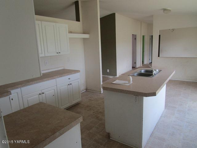 10200 Ahtanum Road Yakima, WA 98903 - Photo 30 of 38 a kitchen with a sink and cabinets