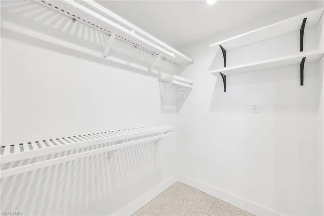 a view of a room with racks on the wall