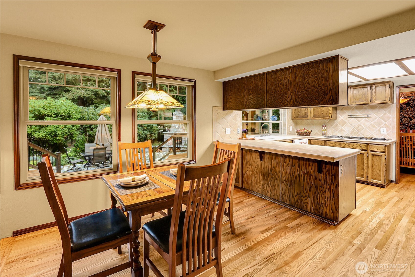 17521 7th Avenue West Bothell, WA 98012 - Photo 14 of 40 a view of a dining room with furniture window and outside view