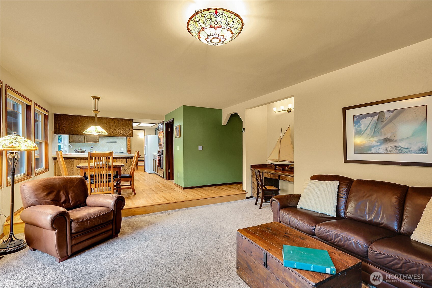 17521 7th Avenue West Bothell, WA 98012 - Photo 16 of 40 a living room with furniture and a lamp