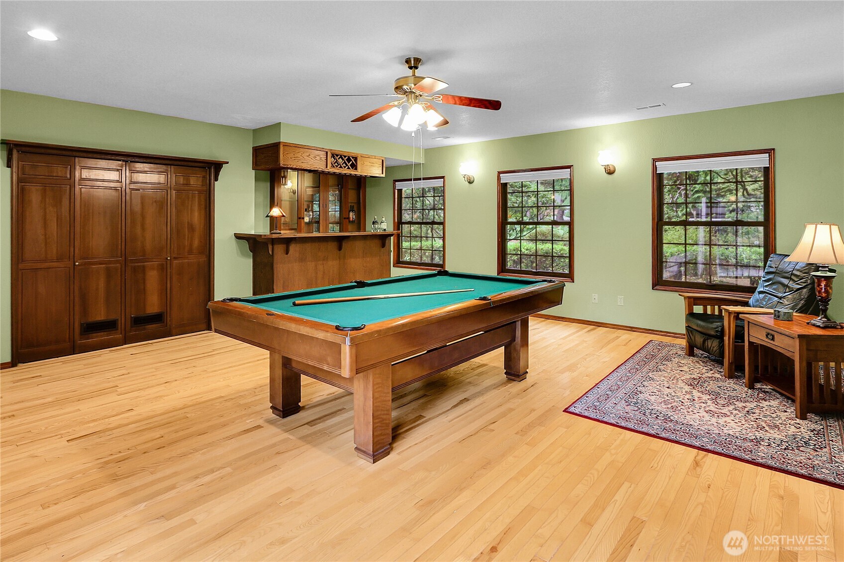 17521 7th Avenue West Bothell, WA 98012 - Photo 19 of 40 a living room with pool table and a flat screen tv