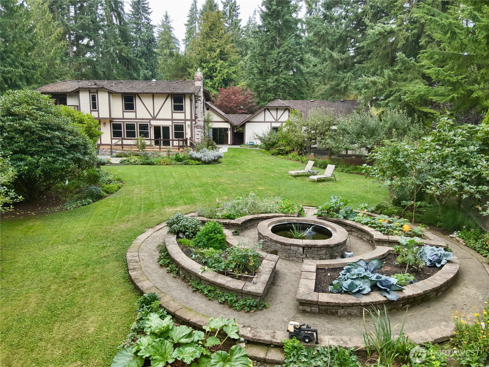 17521 7th Avenue West Bothell, WA 98012 - Photo 2 of 40 a view of a house with backyard sitting area and garden