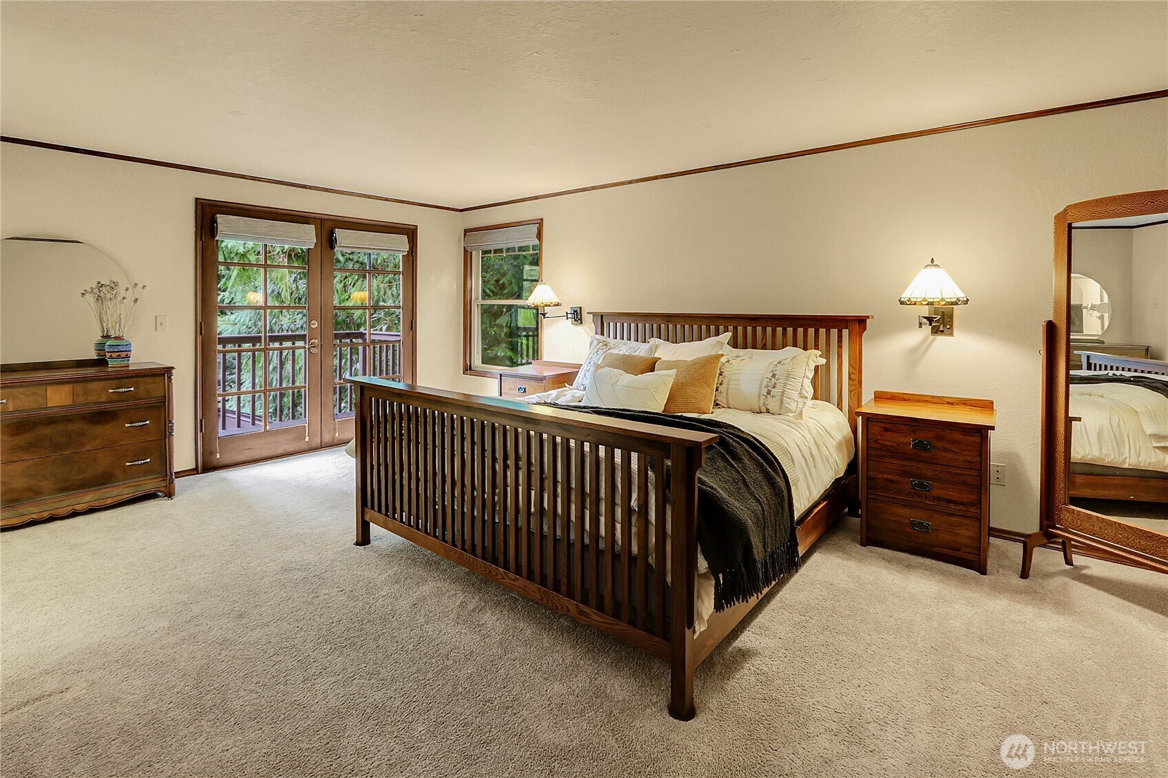 17521 7th Avenue West Bothell, WA 98012 - Photo 21 of 40 a spacious bedroom with a bed and a large window