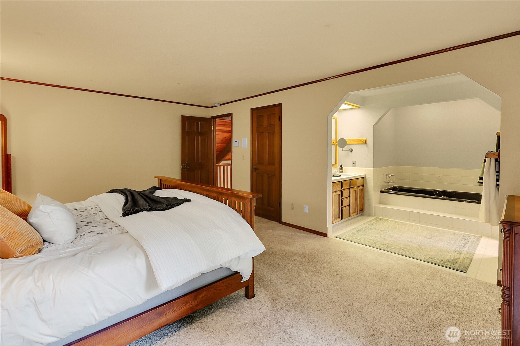 17521 7th Avenue West Bothell, WA 98012 - Photo 22 of 40 a bedroom with a bed and a walk in closet