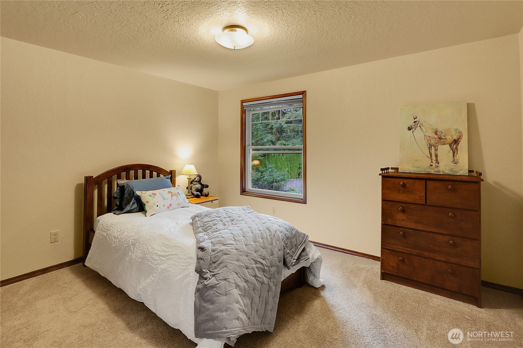 17521 7th Avenue West Bothell, WA 98012 - Photo 26 of 40 a bedroom with a bed and window