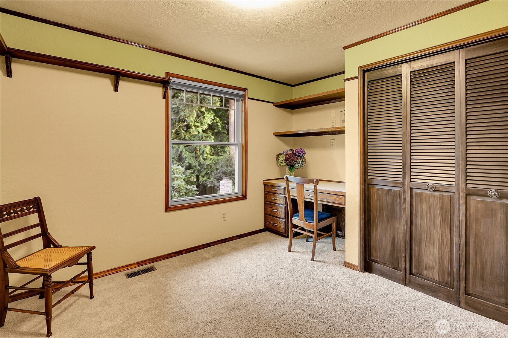 17521 7th Avenue West Bothell, WA 98012 - Photo 27 of 40 a view of a workspace with furniture and a window