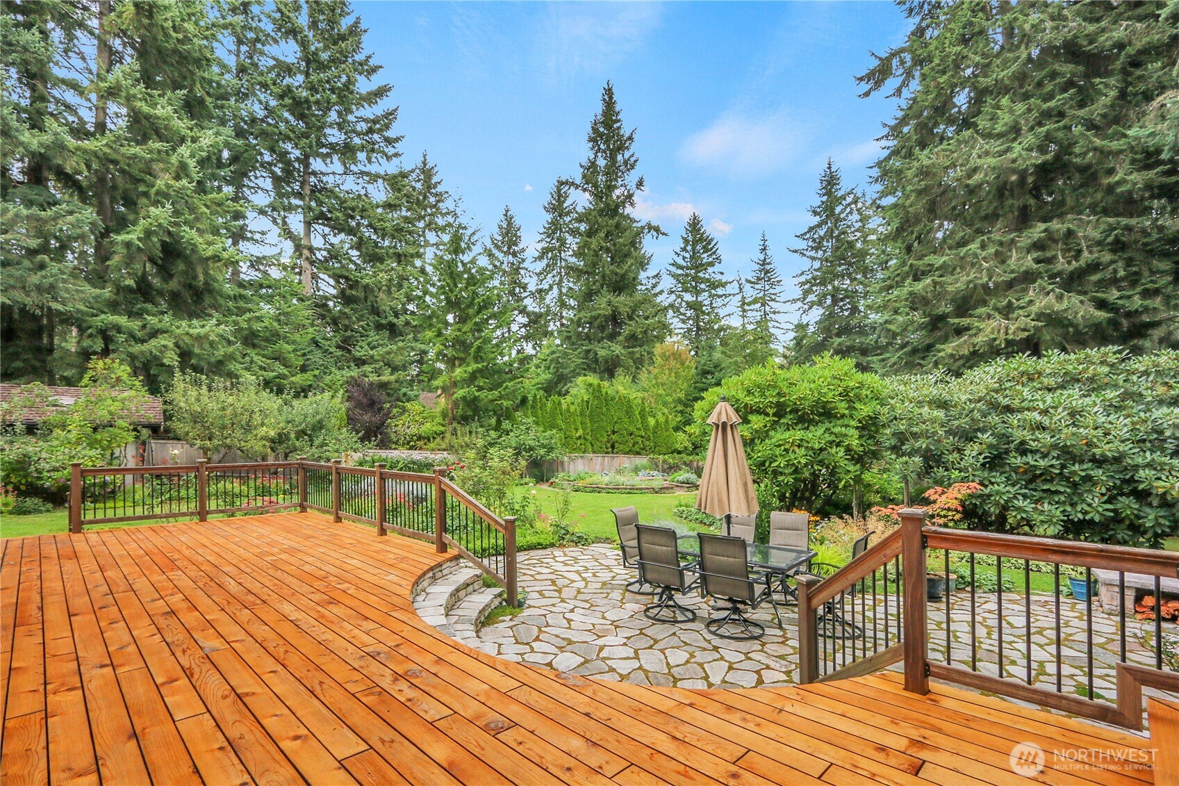 17521 7th Avenue West Bothell, WA 98012 - Photo 31 of 40 a view of a balcony with two chairs and a table
