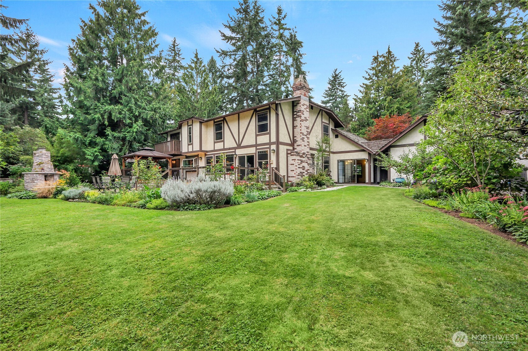 17521 7th Avenue West Bothell, WA 98012 - Photo 34 of 40 a front view of a house with a yard and trees
