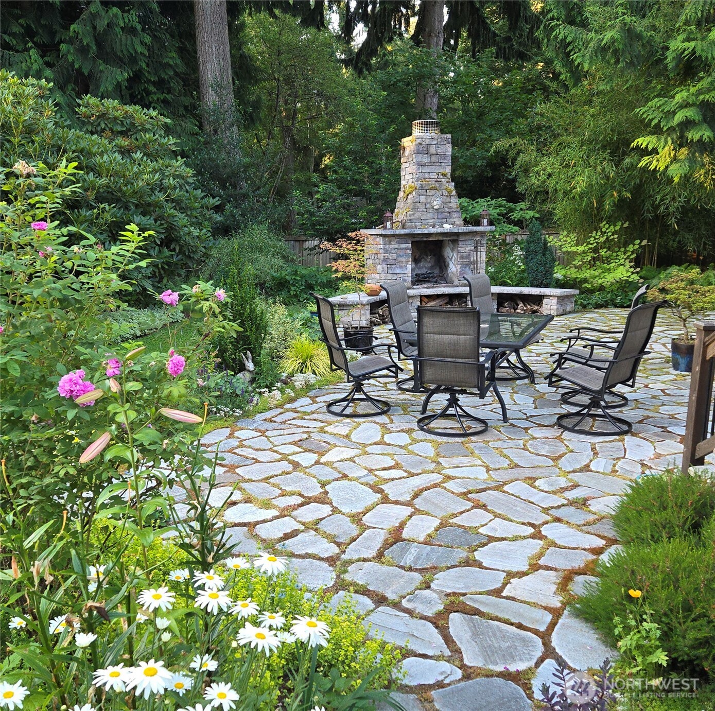 17521 7th Avenue West Bothell, WA 98012 - Photo 36 of 40 a view of a patio with chair and table of chairs