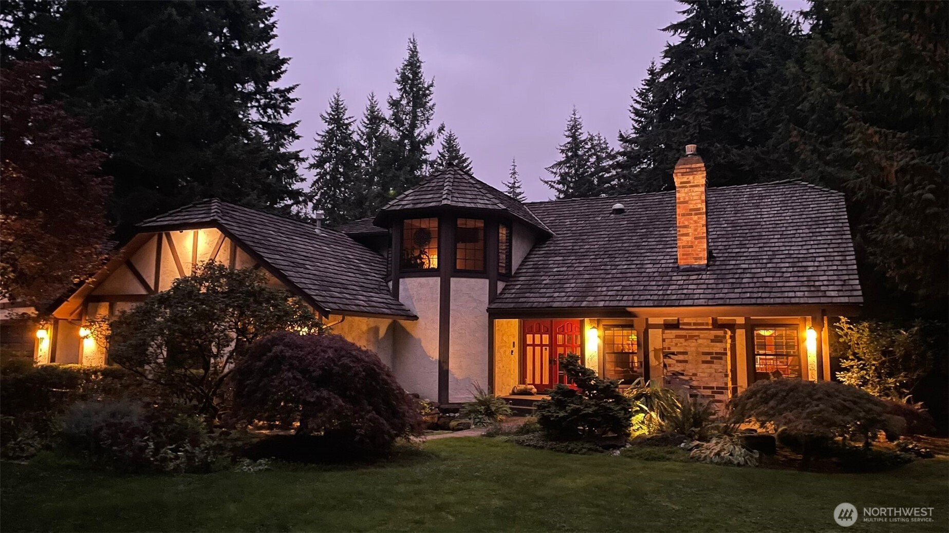 17521 7th Avenue West Bothell, WA 98012 - Photo 37 of 40 a front view of house with yard and green space