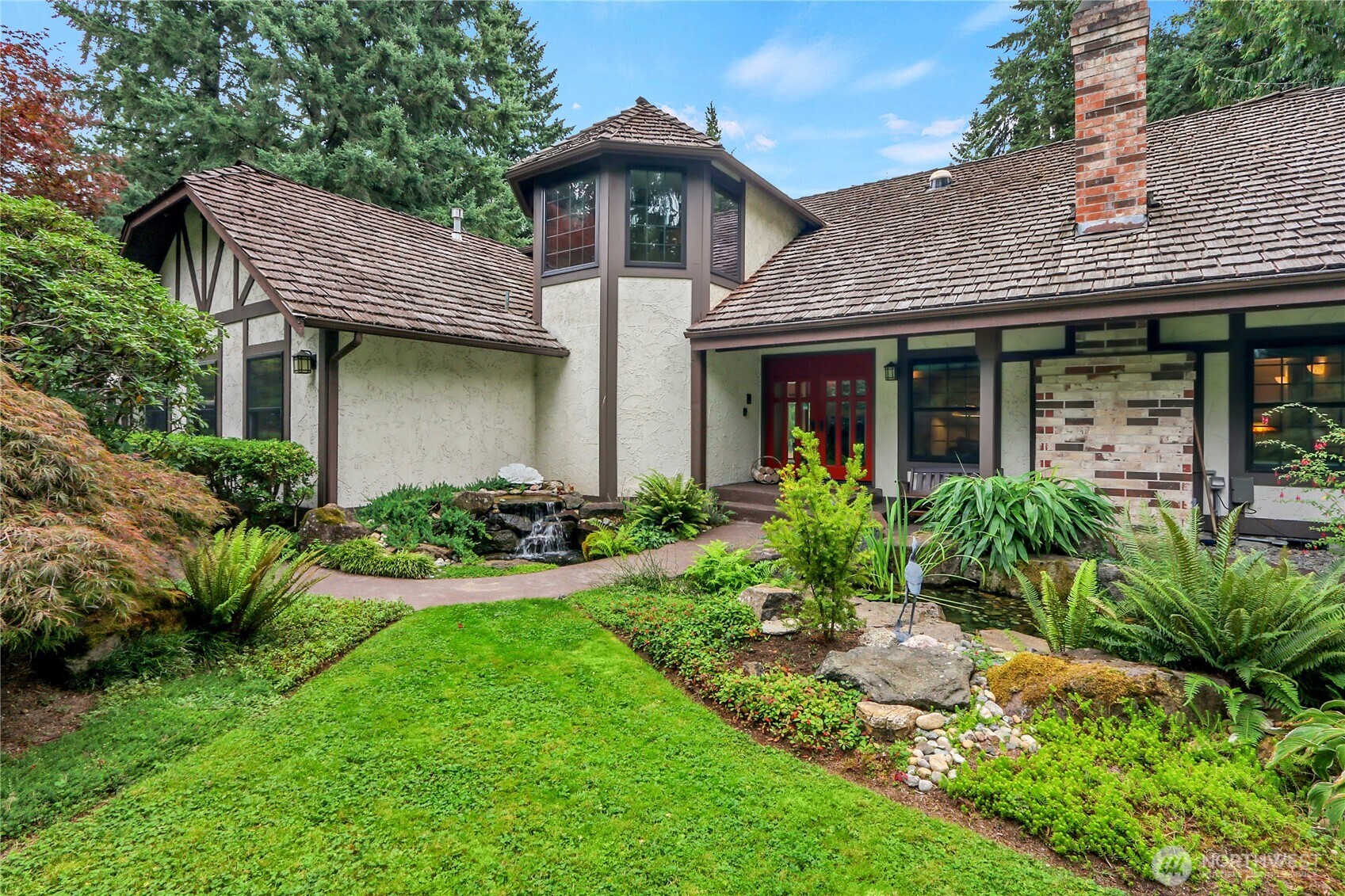 17521 7th Avenue West Bothell, WA 98012 - Photo 4 of 40 a view of a house with garden and plants