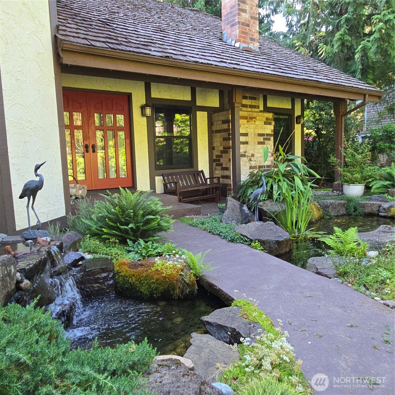 17521 7th Avenue West Bothell, WA 98012 - Photo 6 of 40 a front view of a house with garden