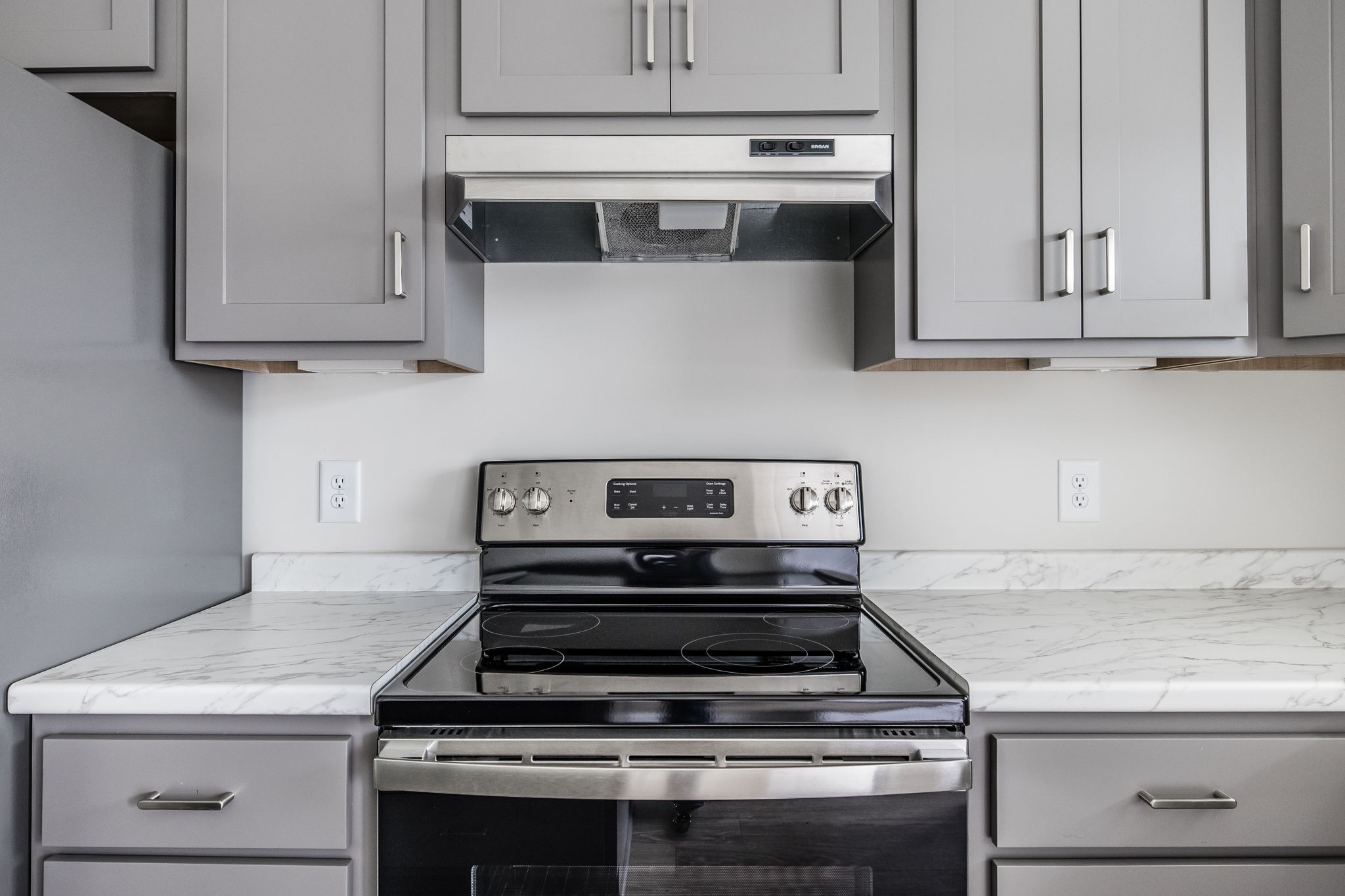 100 Billy Robb Street, Unit B Greenbrier, TN 37073 - Photo 13 of 35 a stove top oven sitting inside of a kitchen