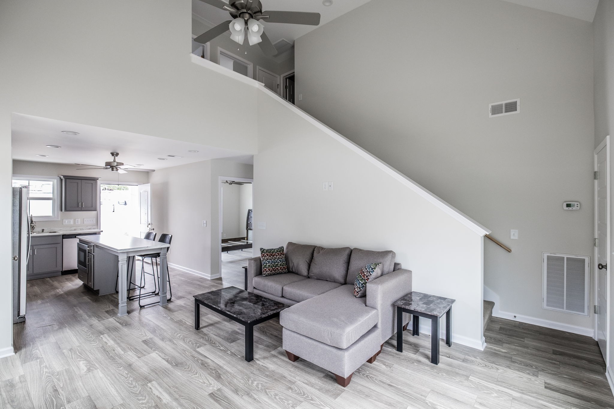 100 Billy Robb Street, Unit B Greenbrier, TN 37073 - Photo 17 of 35 a living room with furniture and a wooden floor