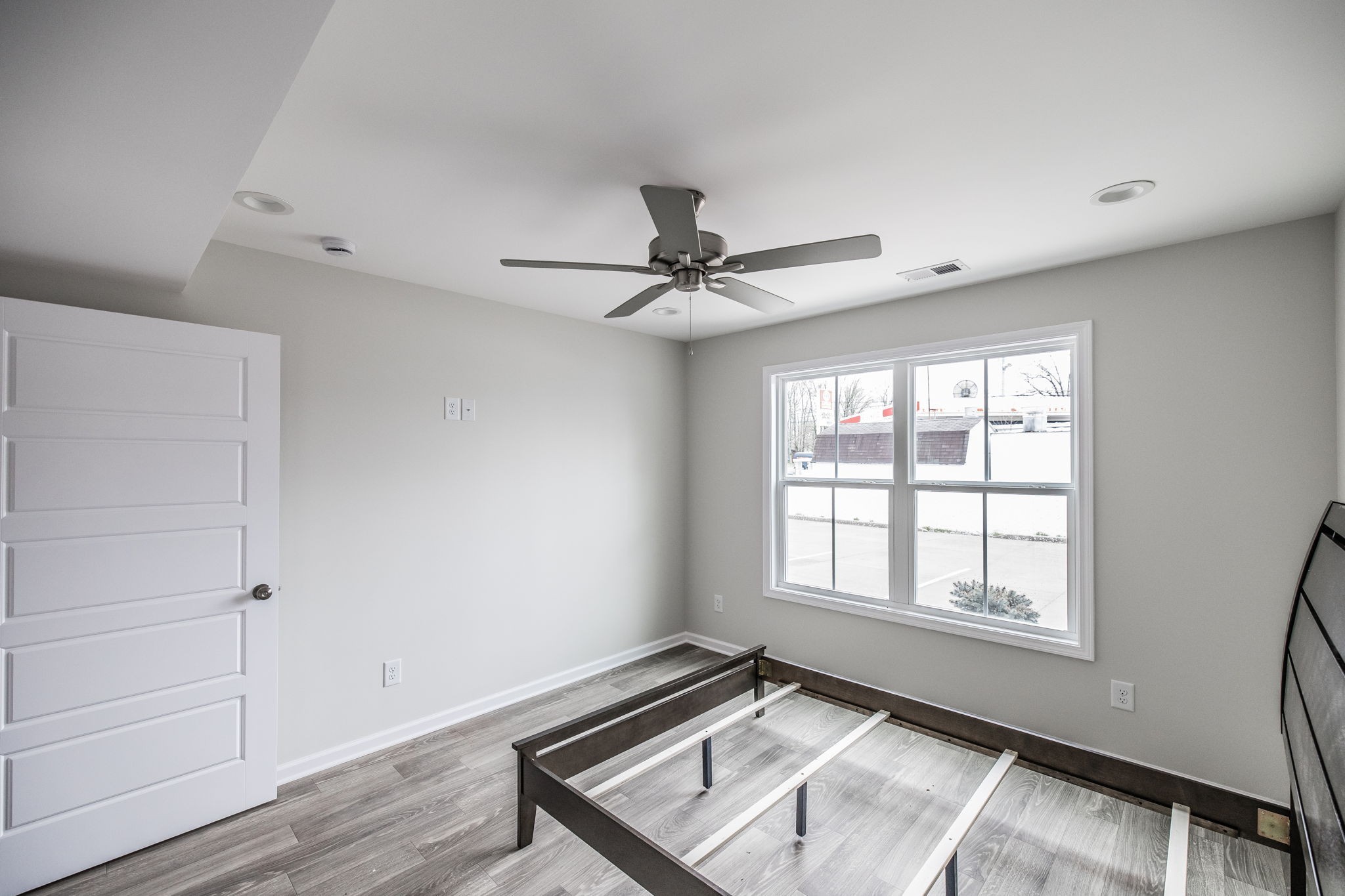100 Billy Robb Street, Unit B Greenbrier, TN 37073 - Photo 24 of 35 a view of a room with window ceiling fan and wooden floor