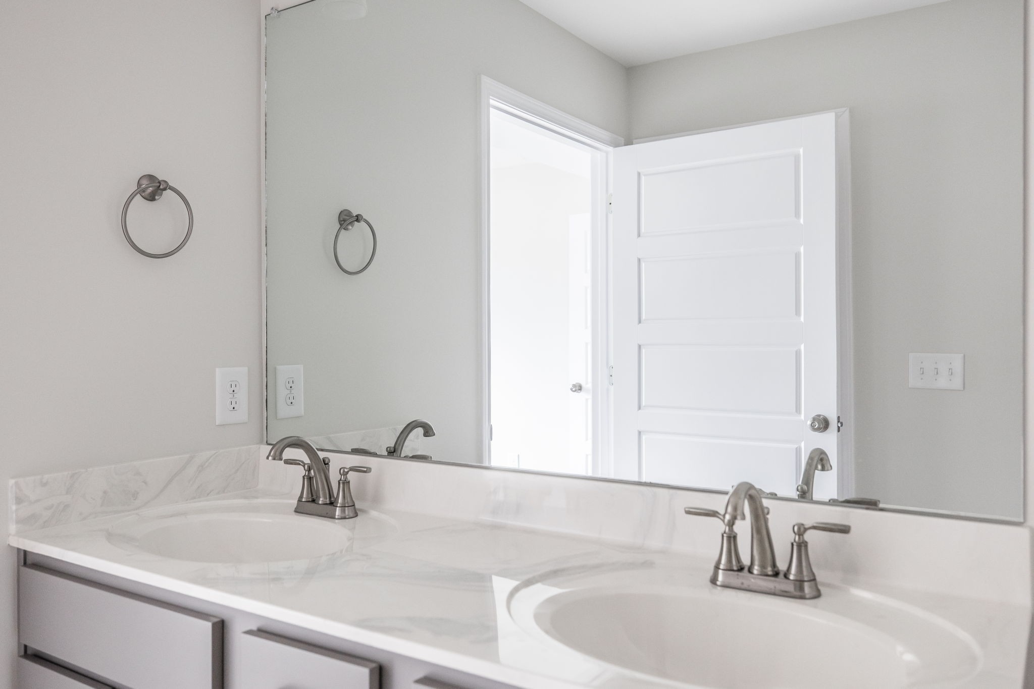 100 Billy Robb Street, Unit B Greenbrier, TN 37073 - Photo 26 of 35 a bathroom with a sink and a mirror