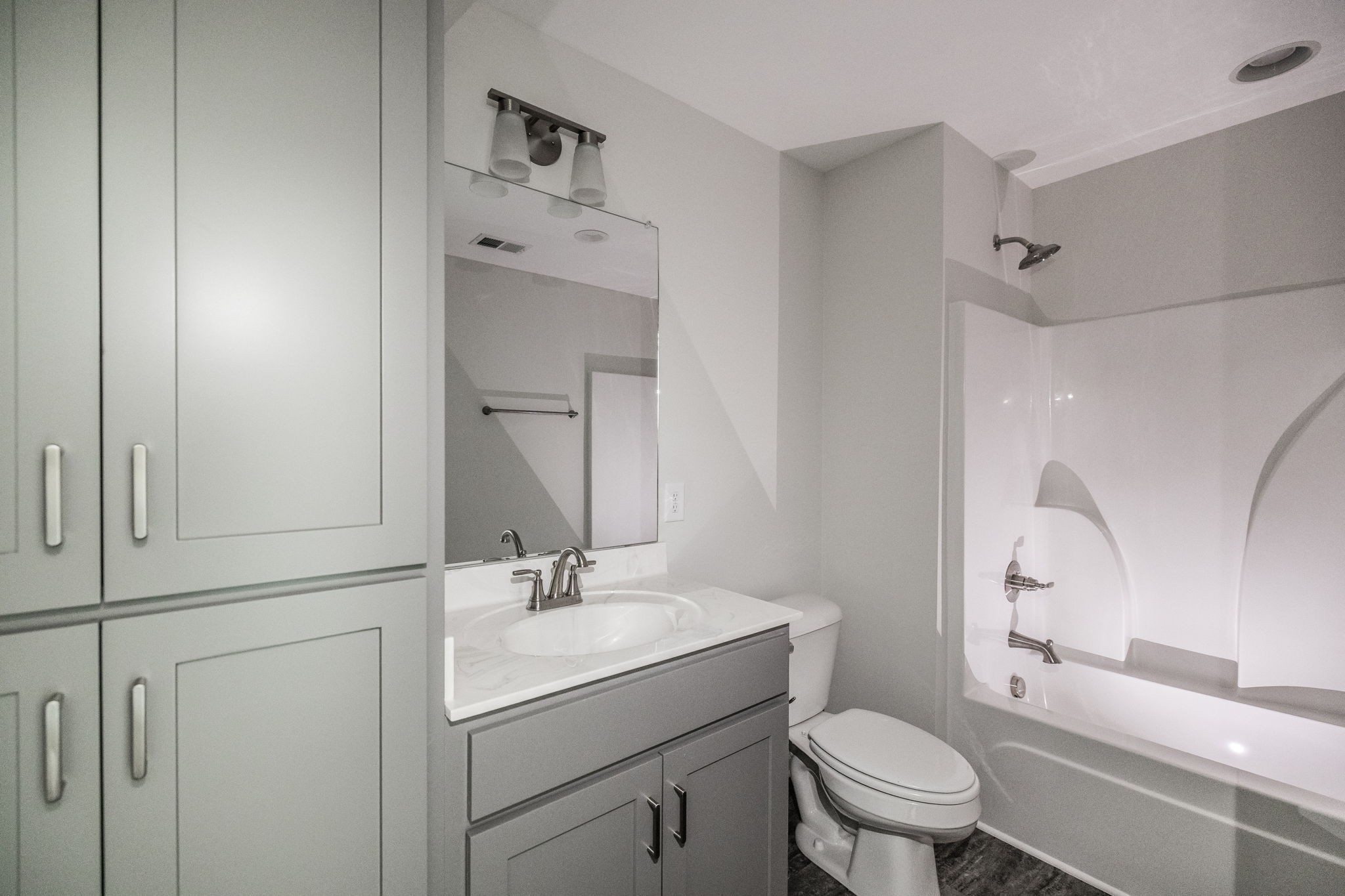 100 Billy Robb Street, Unit B Greenbrier, TN 37073 - Photo 33 of 35 a bathroom with a toilet sink and mirror