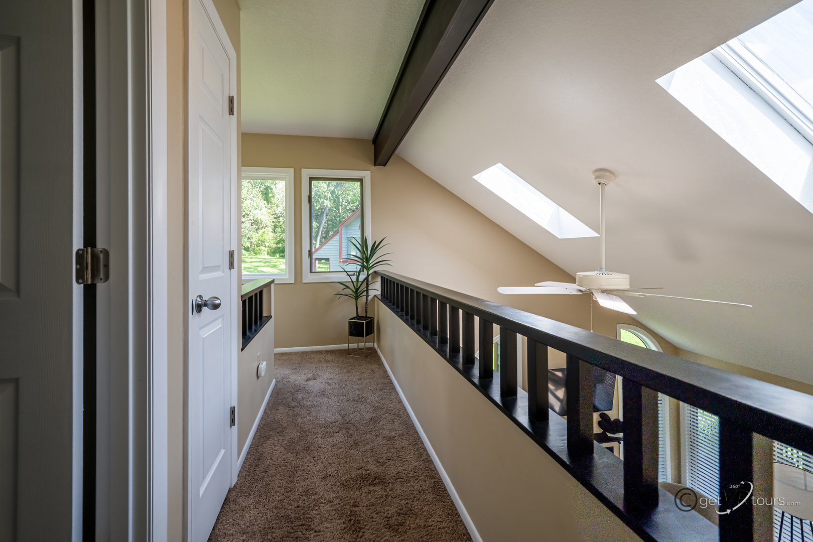 20 Spring Creek Lane Galena, IL 61036 - Photo 8 of 23 a view of a hallway with wooden floor and stairs