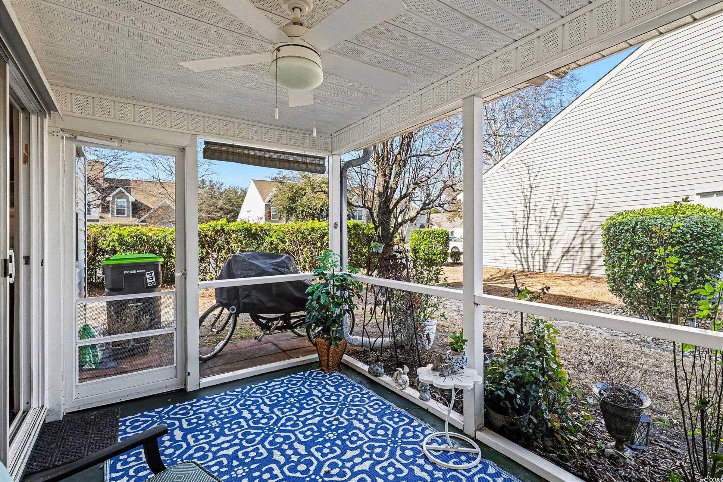 844 Sheridan Road, Unit 844 Myrtle Beach, SC 29579 - Photo 17 of 24 Sunroom with a ceiling fan