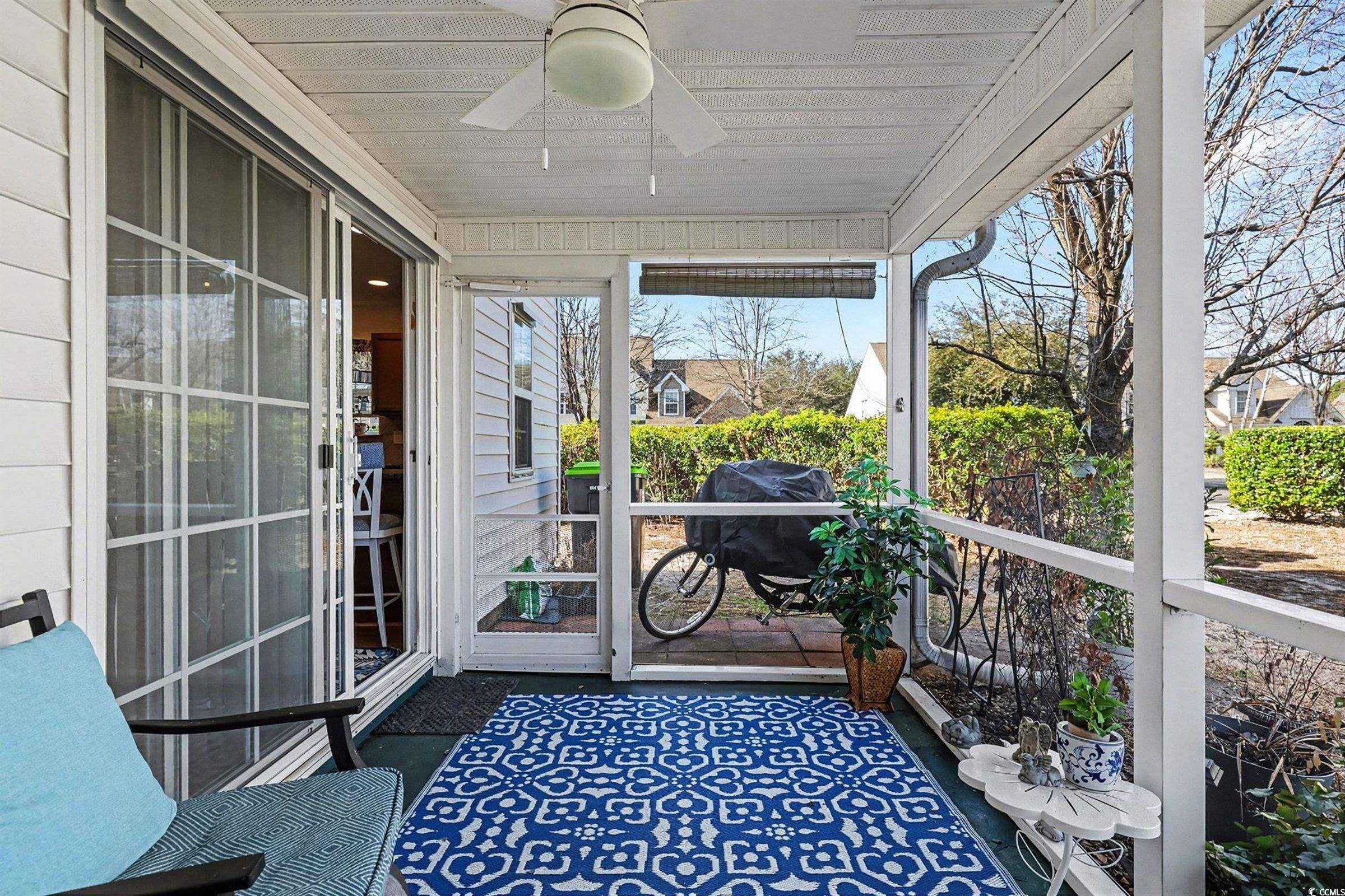844 Sheridan Road, Unit 844 Myrtle Beach, SC 29579 - Photo 18 of 24 Sunroom with ceiling fan