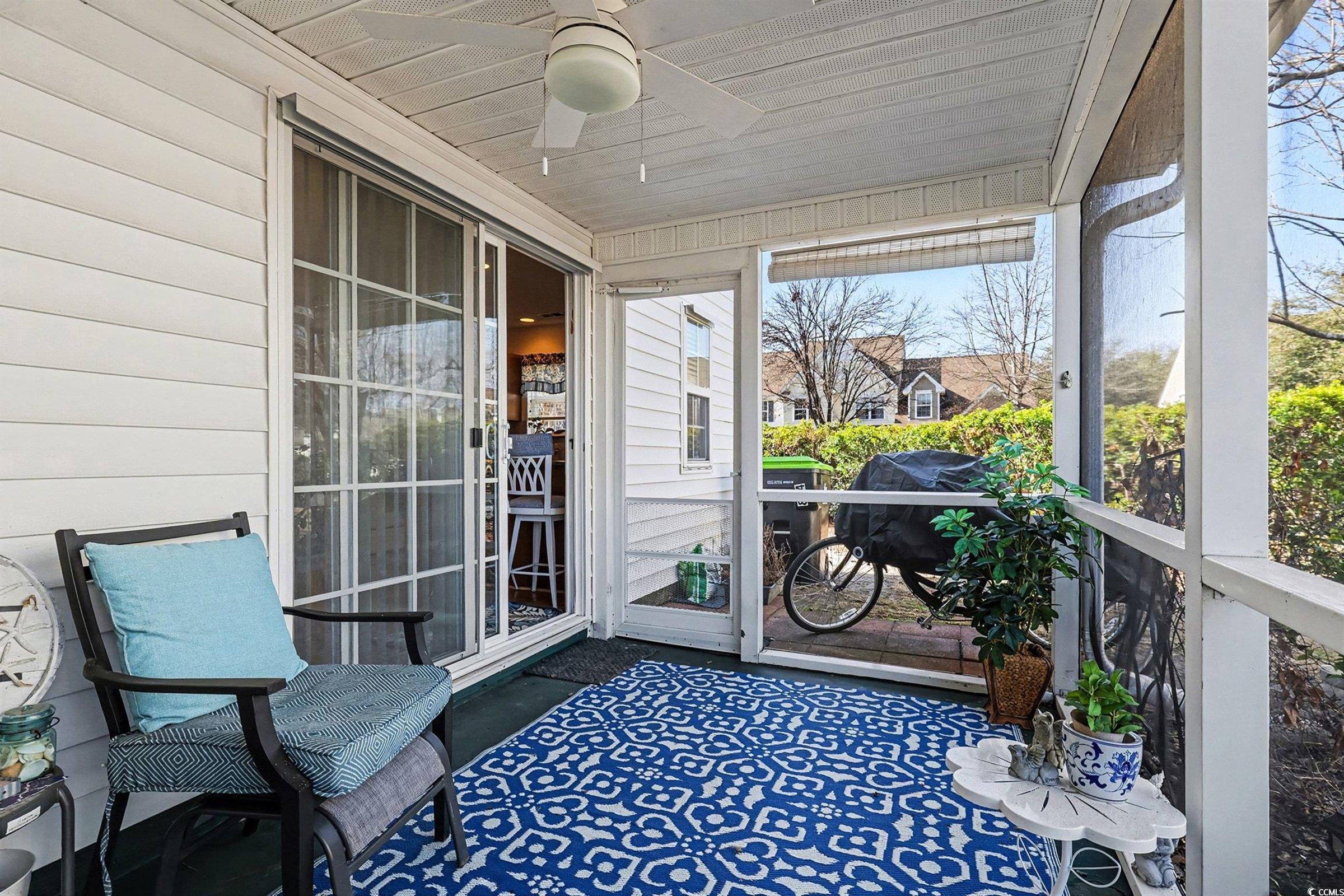 844 Sheridan Road, Unit 844 Myrtle Beach, SC 29579 - Photo 19 of 24 Sunroom featuring ceiling fan