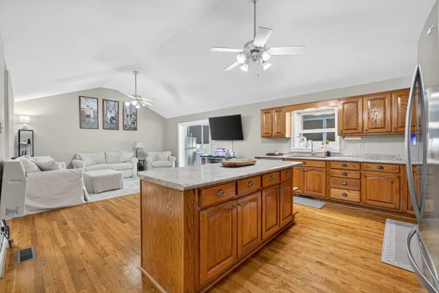 a utility room with faucet washer and dryer